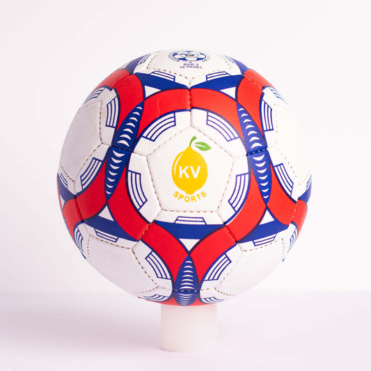 A hand-stitched training football with a geometric pattern in red, white, and blue colors, featuring the logo 'KV Sports'.